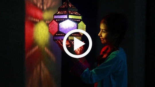 Girl celebrating with lantern