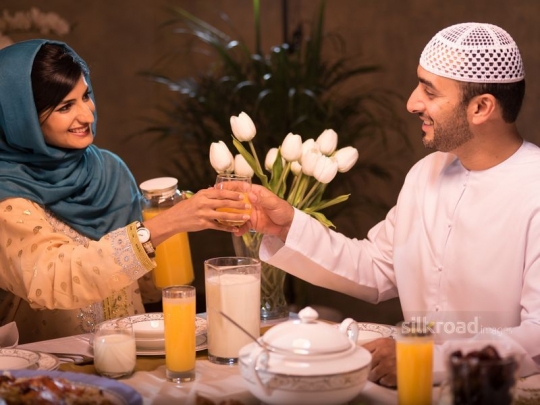 Couple sharing drinks|-