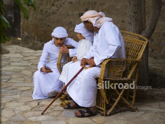 Family enjoying mobile phone content|-