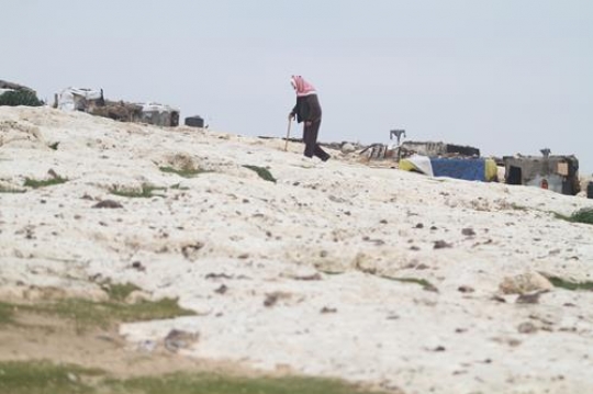 An old Palestinian living next to Bab al-Shams or Gate of the Sun