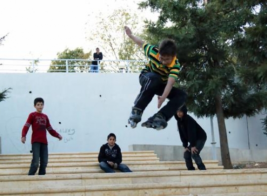boys skating in king hussein park,jordan