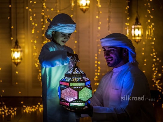 Father and son celebrating ramadan|-