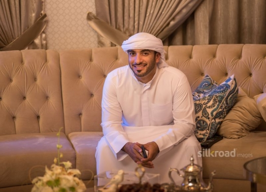 Arabic man smiling|-