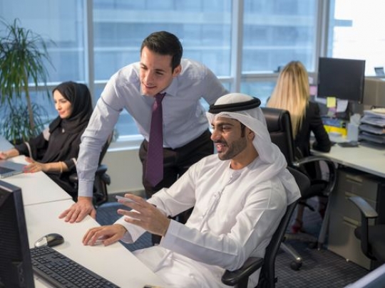 Business men communicating with each other about work|