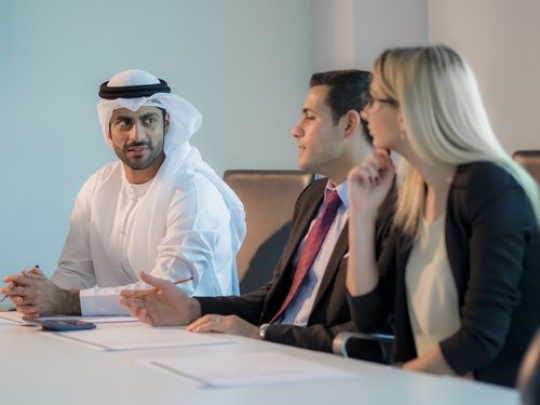 Business men and woman during an office meeting|