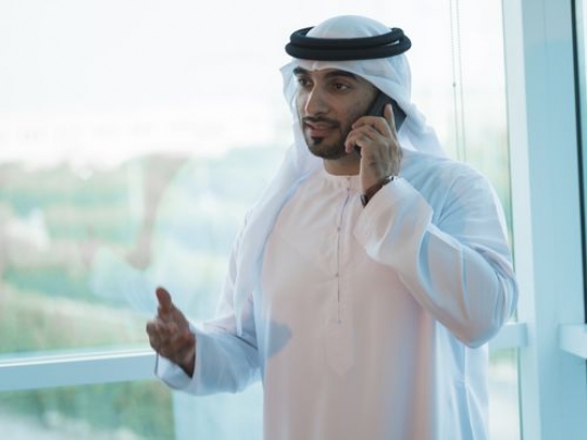 Businessman making a phone call|-