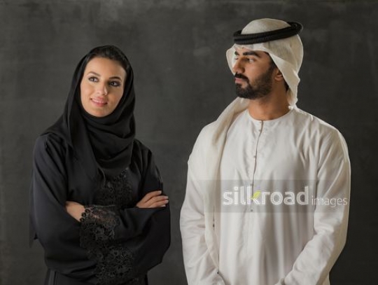 Middle Eastern man looking at the Middle Eastern woman|