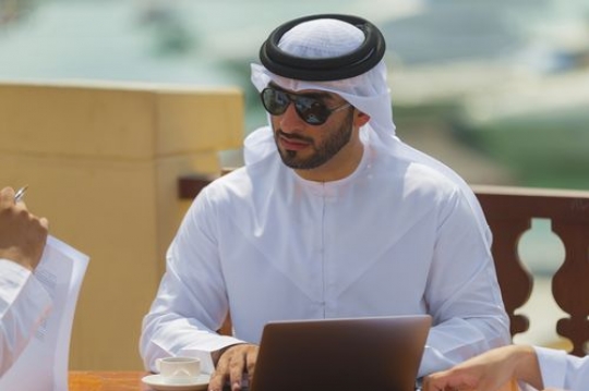 Business man during a meeting with clients|