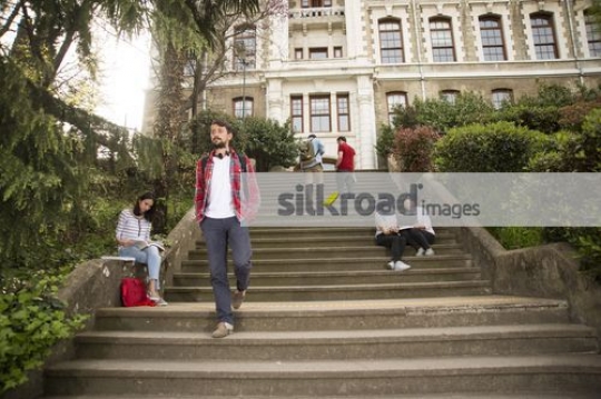 European student walking|