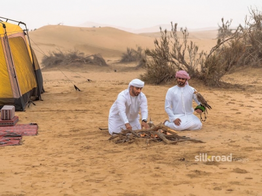 Friends burning wood