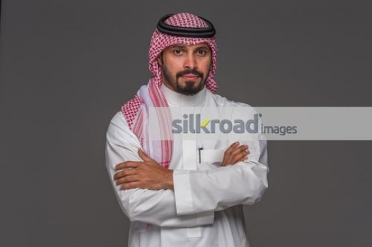 Arab Businessman arms crossed|