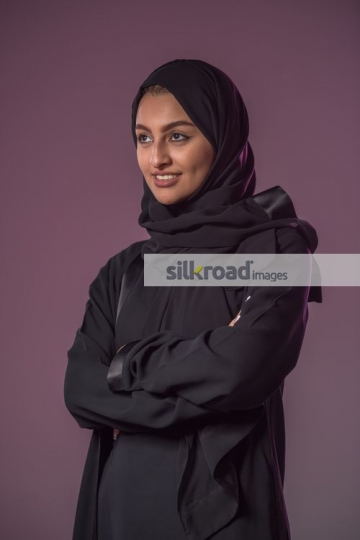 Middle Eastern woman standing|