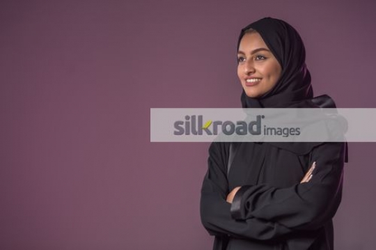 Middle Eastern woman arms crossed|