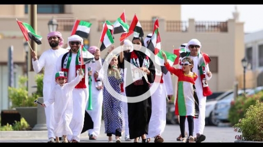 Group of family and friends celebrating the UAE National Day |