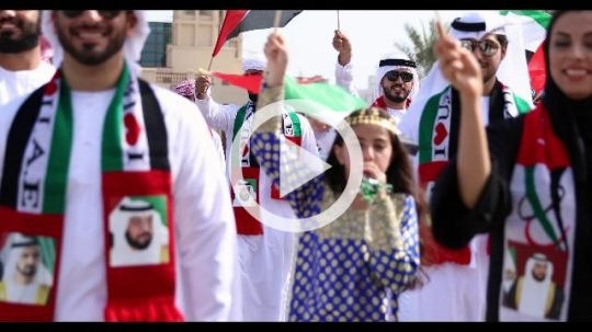 Family representing his country during the National Day parade|