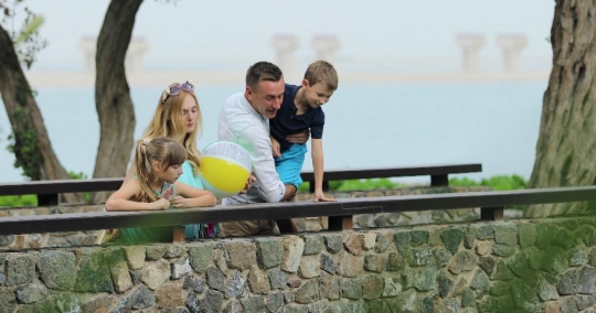 European Family spending time together at the bridge|-