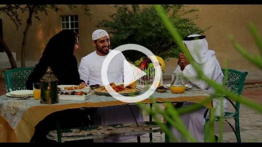 Arab family having iftar together|