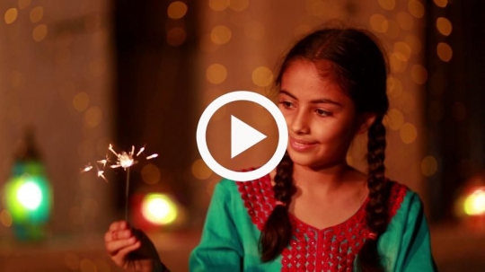 Girl celebrating with fiery matches