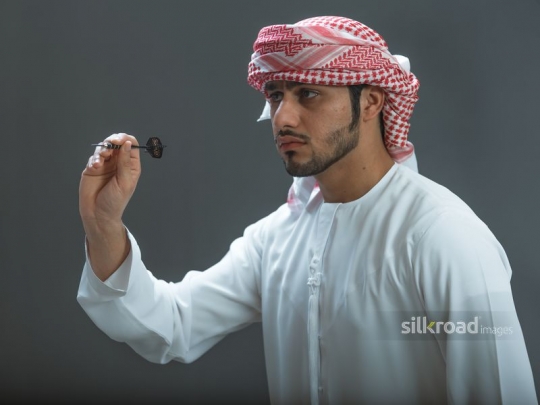 man aiming at goal