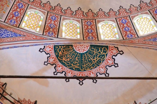 quran verses on the wall in a mosque