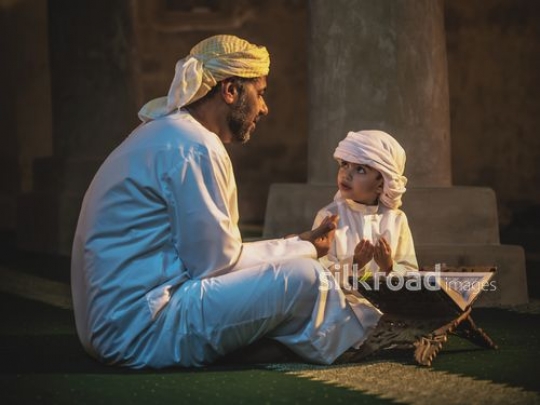 Old man with grandson at the mosque|-