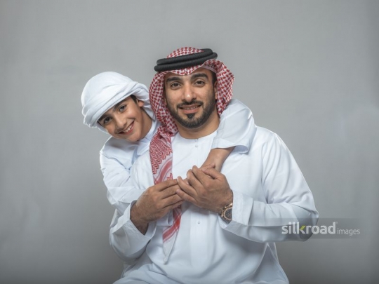 Son hugging father