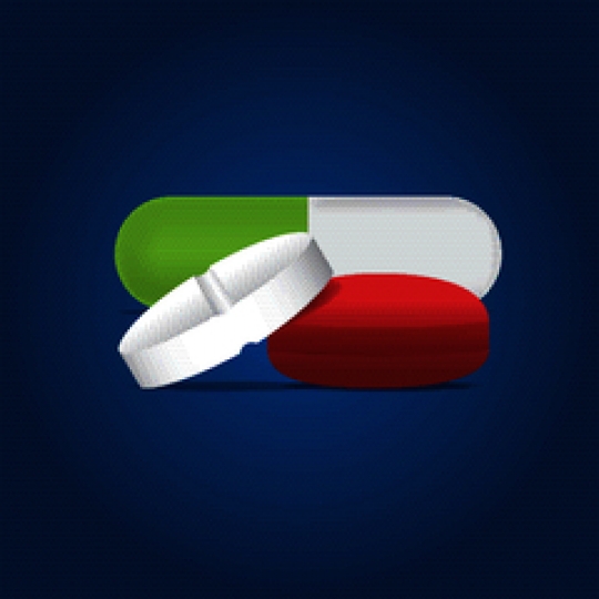 set of different pills on blue background