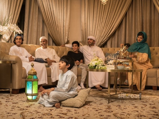 Family watching TV|-