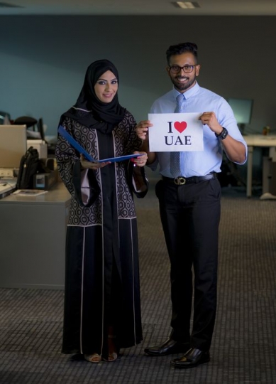 Two employees celebrating National Day|-