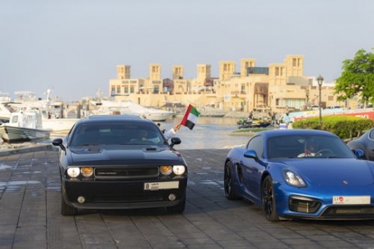 Two cars during a National Day Parade|-