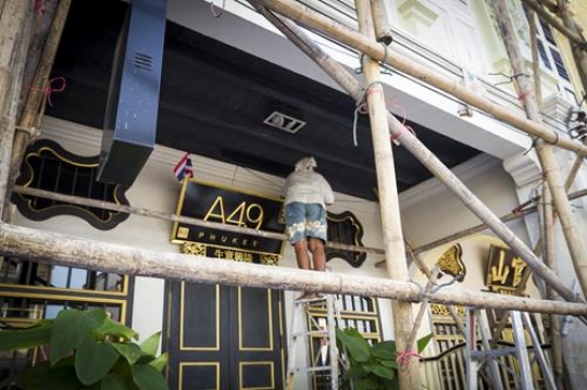 man cleaning the entrance 