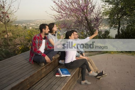Group of friends taking a selfie together|