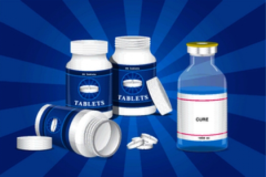 three medical bottles with ampoules on blue background