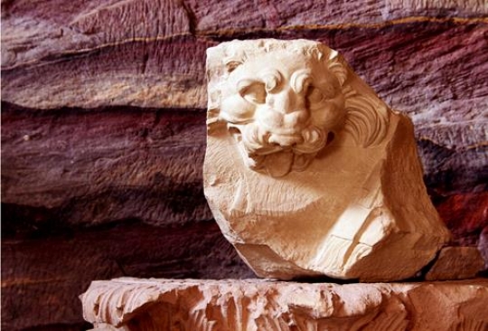 Sandstone gorge abstract pattern formation and lion head Anthropomorphic , Petra, Jordan