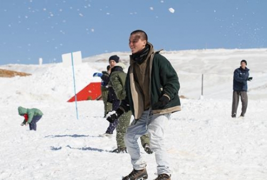 Boys playing in snow