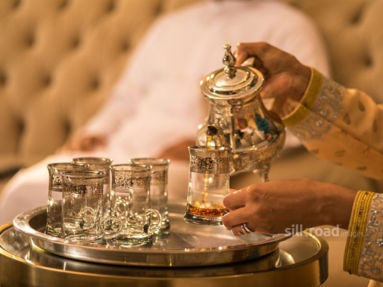 Wife serving tea|-