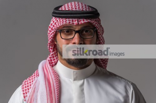 Close up of a Middle Eastern Businessman wearing glasses|