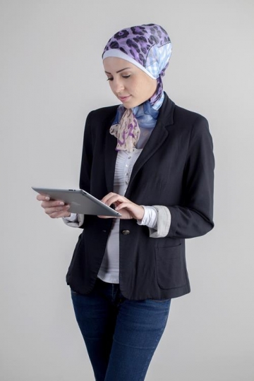 young woman holding ipad