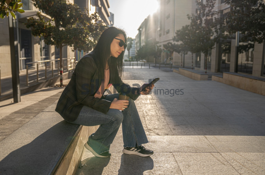 Professional Woman Enjoying Morning Coffee in Al Abdali Boulevard