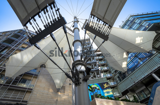 Scenic Landscape of Al Abdali Boulevard with Rotana Tower and Fountain
