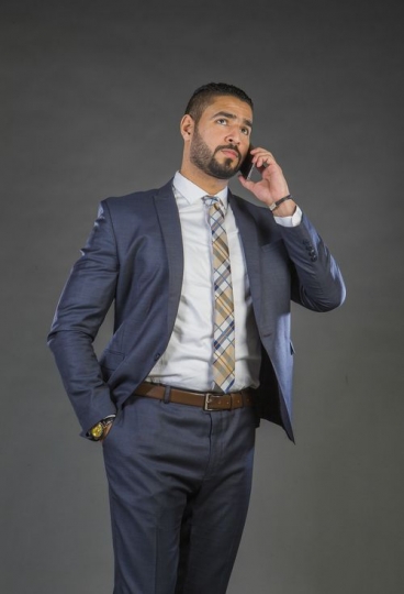 Businessman speaking over the phone|-
