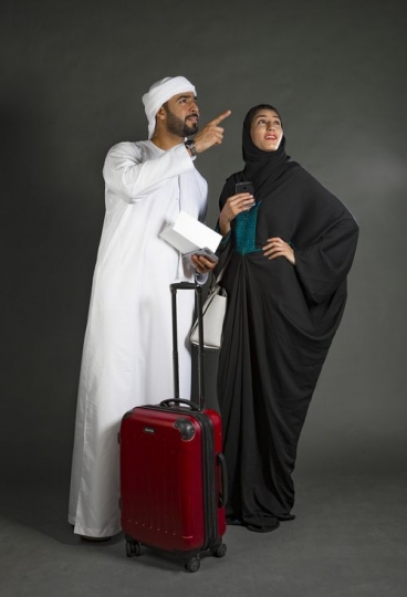 Middle Eastern couple traveling together|-